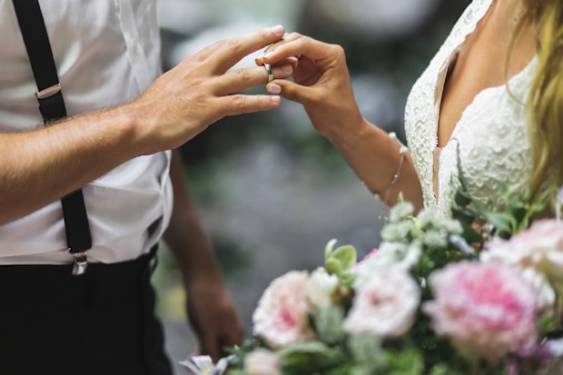 Couple exchanging vows