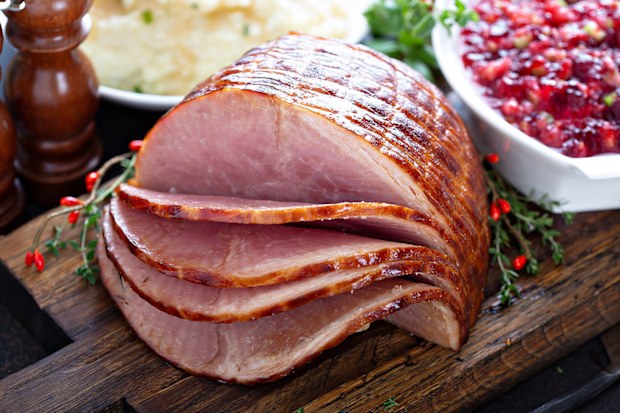 A Christmas ham on a table