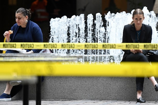 Taped off tables and chairs are seen in a closed cafe after a nationwide shutdown of cafes, restaurants and licensed venues, in Sydney, Tuesday, March 24, 2020.