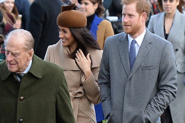 Prince Philip, Prince Harry and Meghan Markle leave Christmas Day service together.