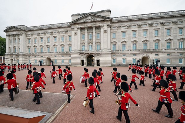 Members of the Nijmegen Company Grenadier Guards and the 1st Battalion the Coldstream Guards take part in the Changing of the Guard, in the forecourt of Buckingham Palace