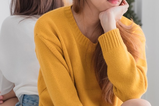 Women sitting in bedroom