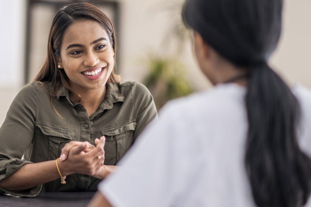 Woman talking to her doctor