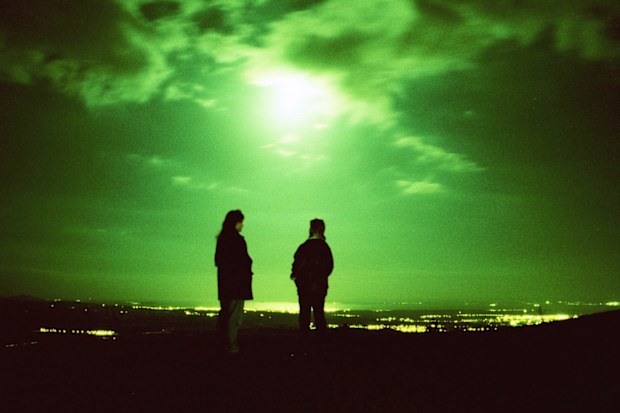 UFO spotters looking out over the Forth Valley in central Scotland where unexplained sightings are said to be frequent in Bonnybridge, Stirlingshire