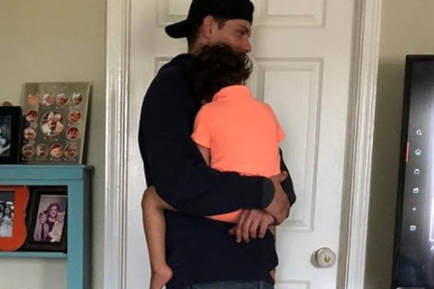 Tradie comforts boy in USA