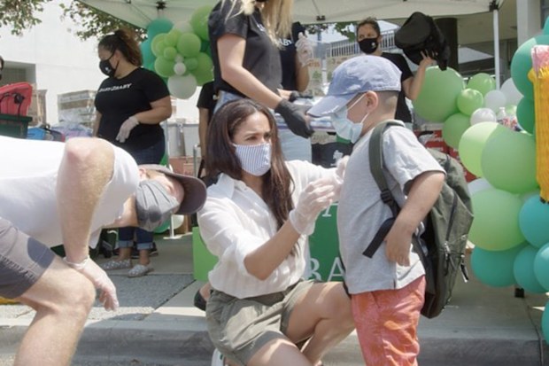 Harry and Meghan volunteering at Baby2Baby event in LA