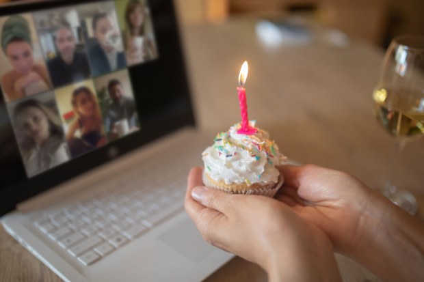 Woman celebrating birthday in isolation
