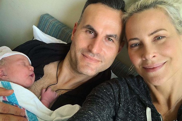 Actress Brittany Daniel with husband Adam and daughter Hope.