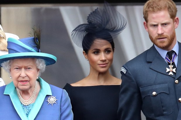 Harry, Meghan and Queen Elizbeth in 2018.