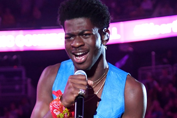 Lil Nas X, performs, on stage, singing, iHeartRadio Music Festival
