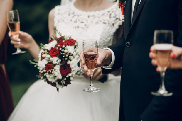 Drinking champagne at wedding 