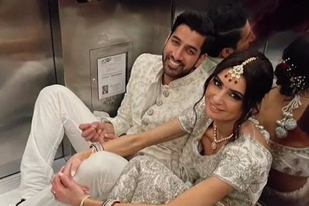 bride and groom trapped in hotel lift wedding