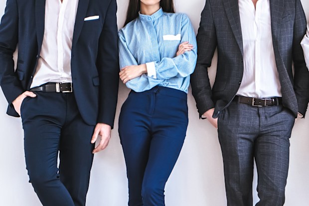 Two businessmen and a businesswoman