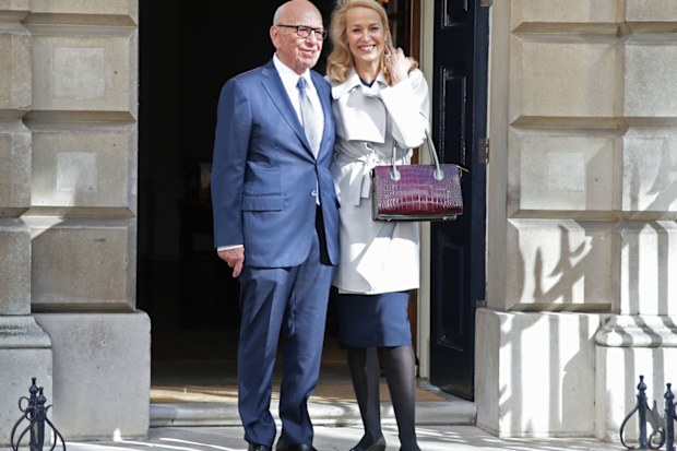 Rupert Murdoch and Jerry Hall pose for photos after wedding in a private ceremony in London. (AAP)