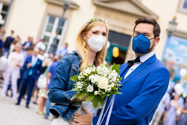 Couple at their wedding during coronavirus