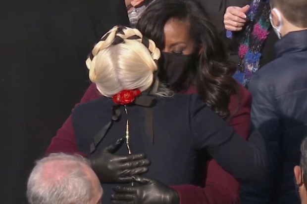 Michelle Obama and Lady Gaga hug at Joe Biden's inauguration