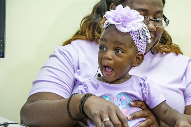 Adorable moment a deaf toddler hears for the first time after receiving cochlear implants. 