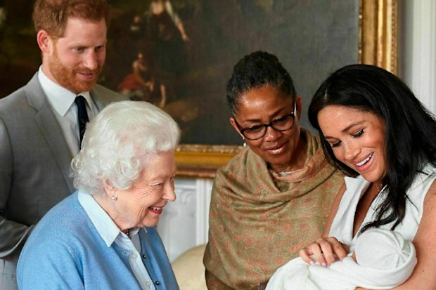 The Queen meeting her new great-grandchild Archie.