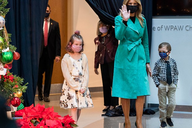 First lady Melania Trump arrives to read a Christmas story at Children's National Hospital, Tuesday, Dec. 15, 2020.