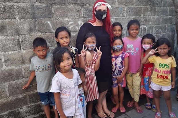 Let's Help Bali founder Amanda with some of the children she has helped