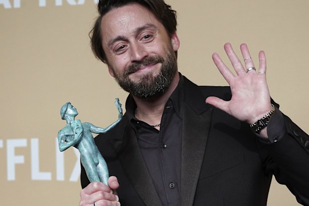Kieran Culkin with his SAG Award for outstanding performance by a male actor in a supporting role for A Real Pain on February 23, 2025, at the Shrine Auditorium in Los Angeles. 