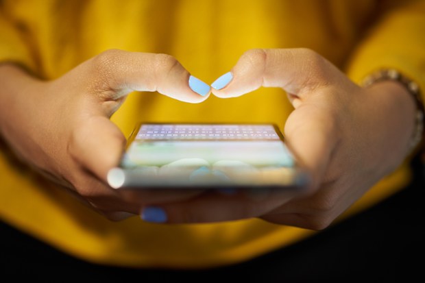 Woman texting on phone