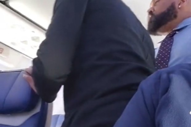 Several flight attendants attempted to reason with the angry man. 