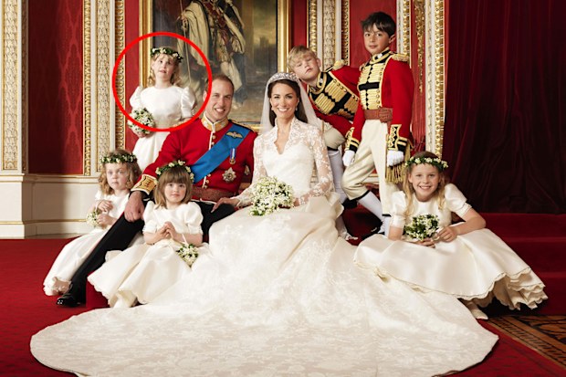 In this photo provided by Clarence House on Saturday, April 30, 2011, Britain's Prince William, center left, and his wife Kate, Duchess of Cambridge, center right, pose for a photograph.