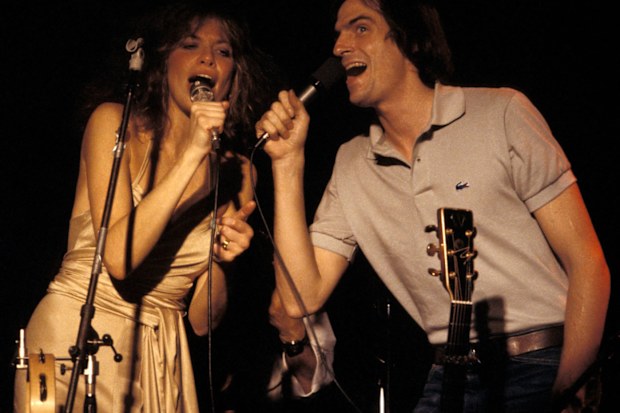 Carly Simon and James Taylor performing together