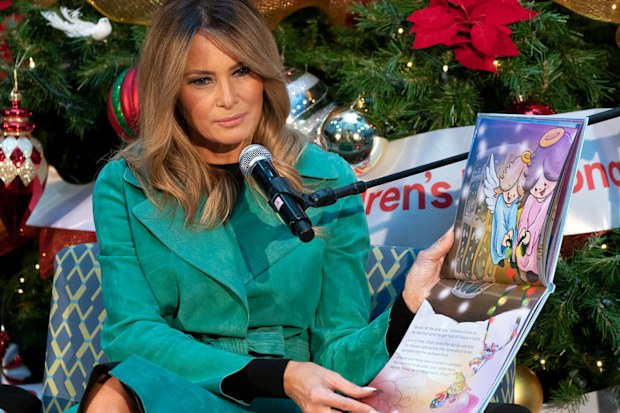 First lady Melania Trump reads to patients at Children's National Hospital.