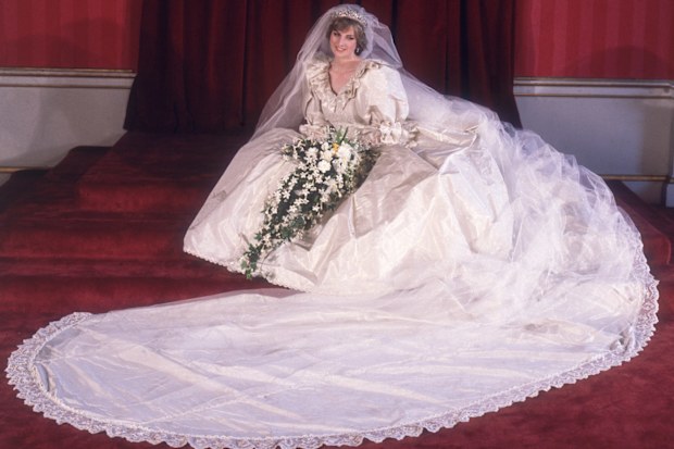 Formal portrait of Lady Diana Spencer (1961 - 1997) in her wedding dress designed by David and Elizabeth Emanuel.  