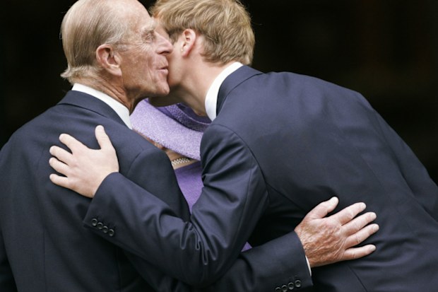 Prince Philip kisses grandson Prince William.