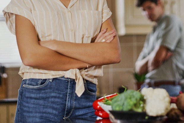 Couple fights in kitchen