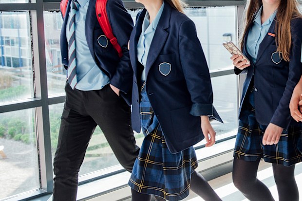 High school students walking to their next class.