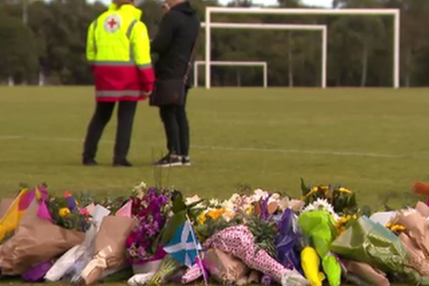 Flowers at the park where Eurydice was allegedly raped and murdered last week. (9News)