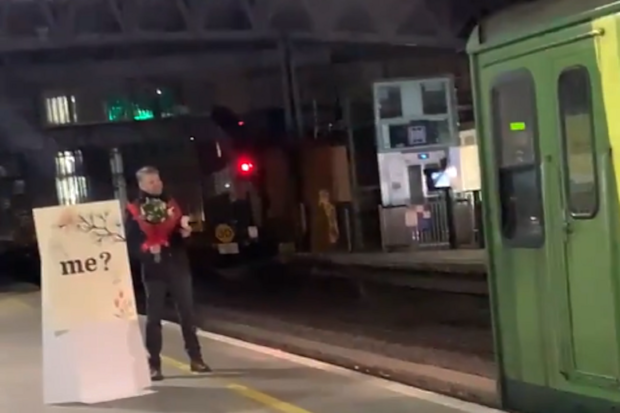 Man proposes as girlfriend drives train into station