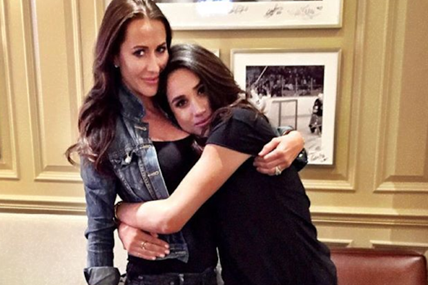 Jessica Mulroney and Meghan Markle hugging