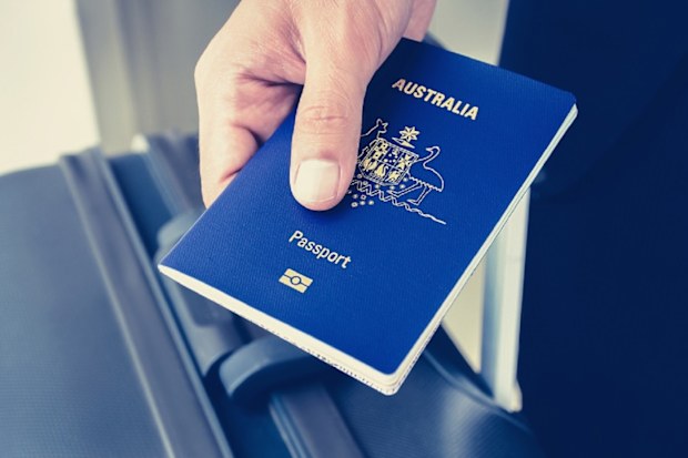 Man holding Australian passport