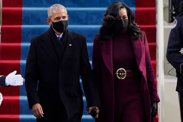 Former President Barack Obama and his wife Michelle arrive for the 59th Presidential Inauguration at the U.S. Capitol for President-elect Joe Biden in Washington, Wednesday, Jan. 20, 2021. (AP Photo/Patrick Semansky, Pool)