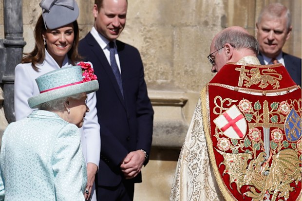 Members of Britain's Royal family watch as Britain's Queen Elizabeth II arrives to attend the Easter Mattins Service at St. George's Chapel, at Windsor Castle in England Sunday, April 21, 2019