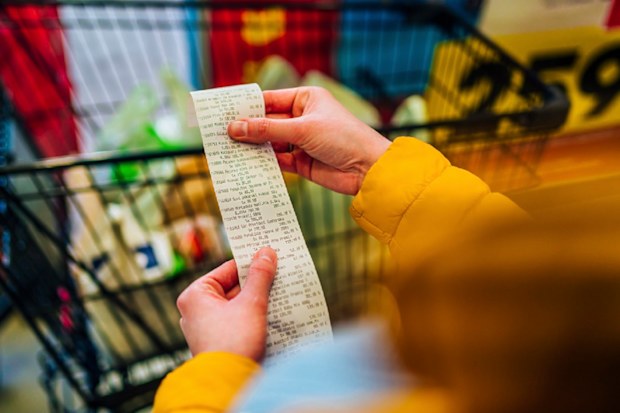 paying for groceries at the supermarket