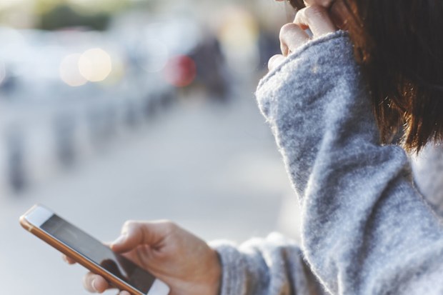 Woman looking at her phone.