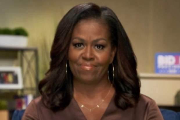 Michelle Obama VOTE necklace available online.