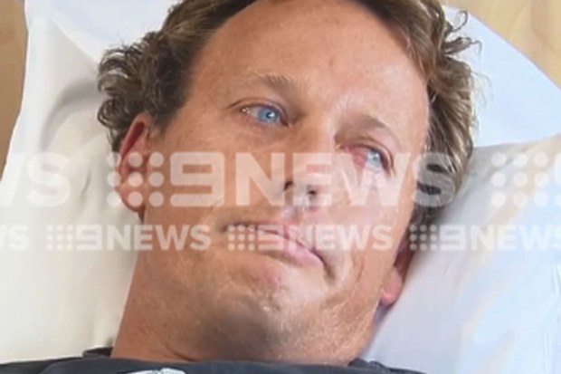 Lee Jonsson told 9News he used his surfboard to beat the shark away before he swam into shore and took himself to hospital.