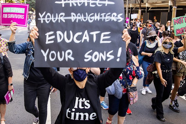 Protesters march towards  Parliament House during March 4 Justice