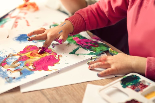 Child finger painting