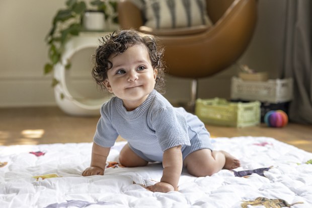 A baby learning how to crawl