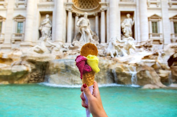 Gelato in front of the Trevi Fountain in Rome