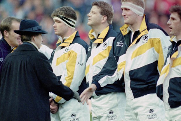 Scotland player Doddie Weir shakes hands with Anne, Princess Royal before an match against Australia in 1996.