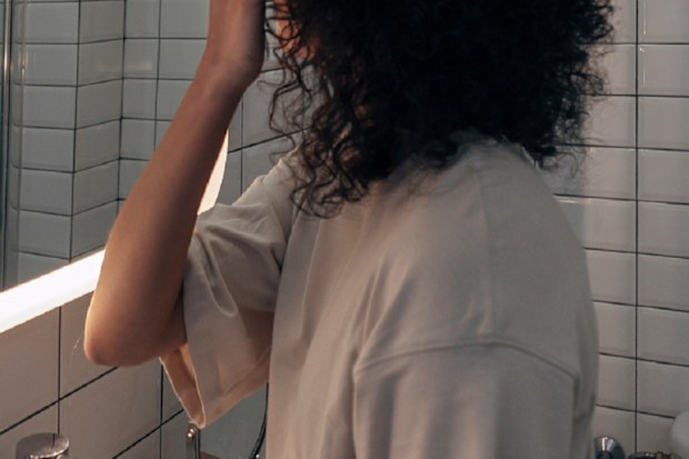 Woman using bathroom